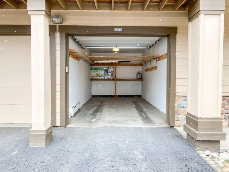 1 Car Heated Garage, 1 Parking Space is also included just outside of the garage (can accommodate 2 regular-sized vehicles total)