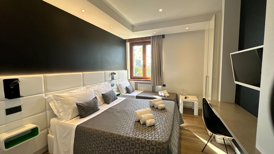 Premium bedding, blackout drapes, soundproofing, free WiFi