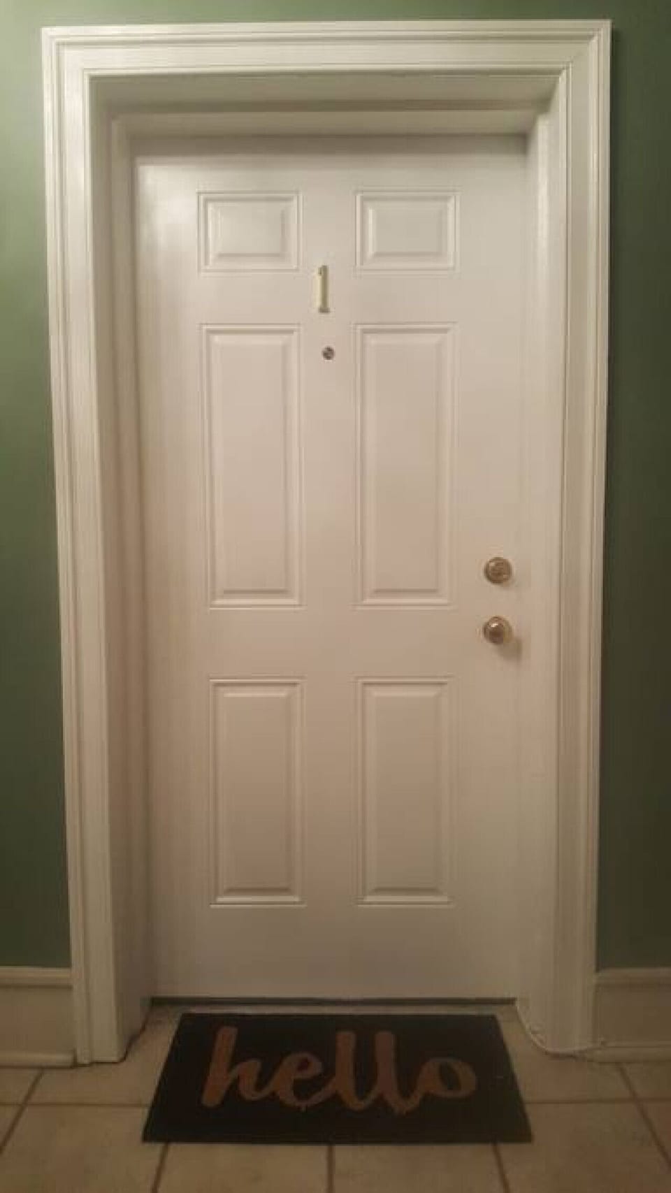 Apartment entrance - on the ground floor of a small, 3 story apartment building