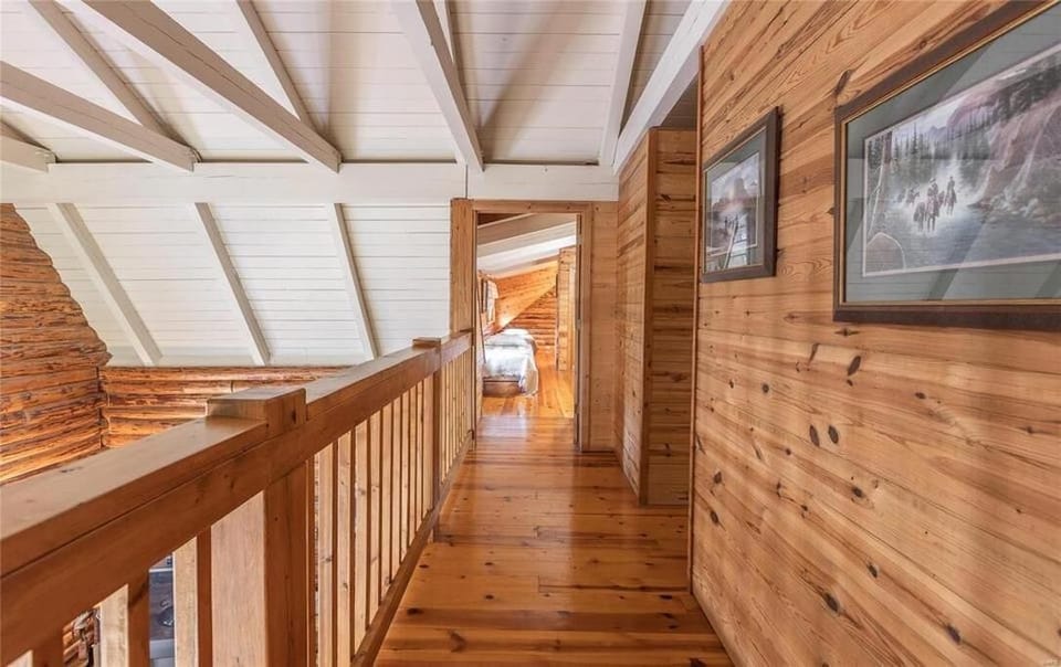 Second story elevated walkway to bedrooms 2 and 3
