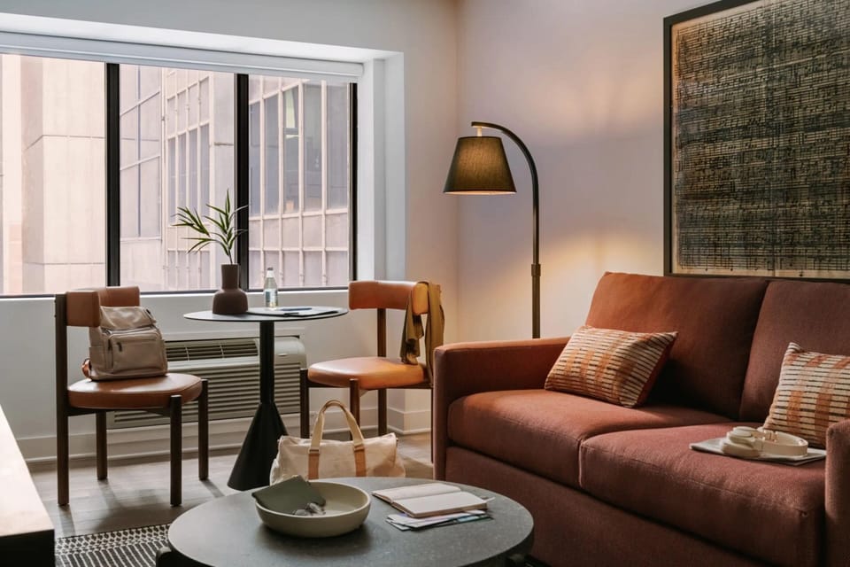 Signature Suite, 1 King Bed with Sofa bed, Non Smoking, Kitchen (Separate Living Room;with Sofabed) | 1 bedroom, hypo-allergenic bedding, individually decorated