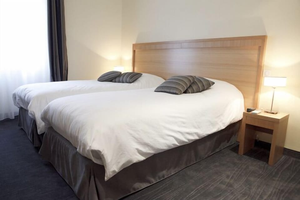 	Superior Room, 2 Twin Beds, Private Entrance | In-room safe, desk, iron/ironing board, free WiFi