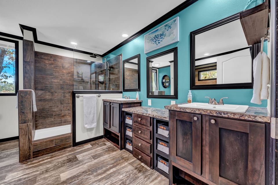 Master bathroom has double sinks and and extra large shower. 