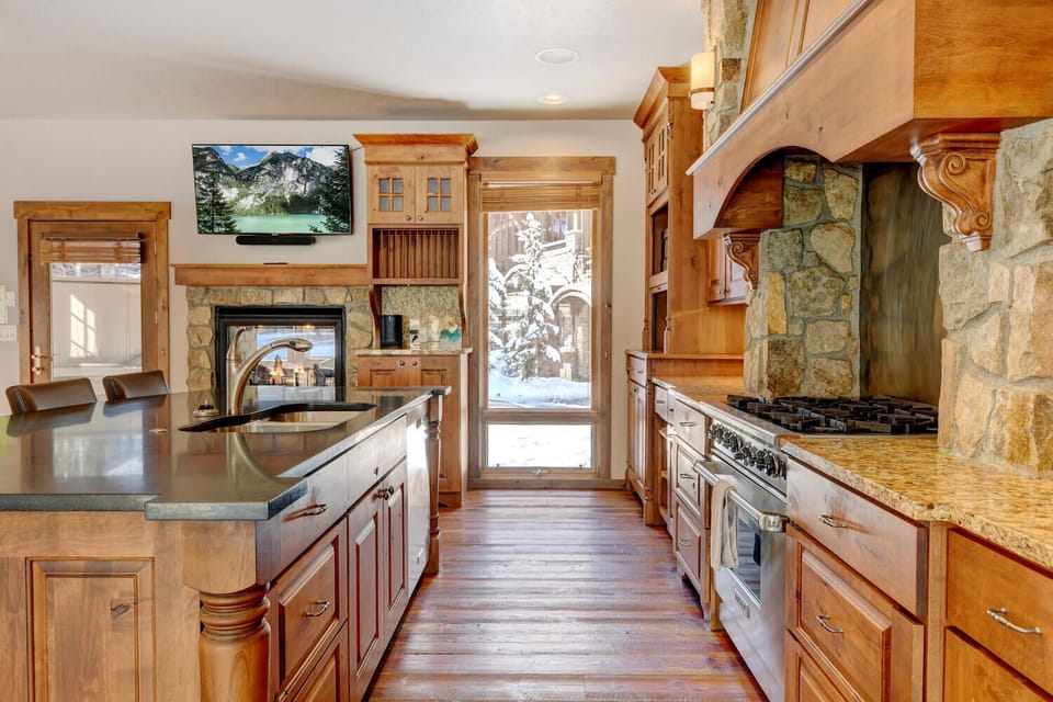 Custom Doulble Sided Fireplace In the Kitchen