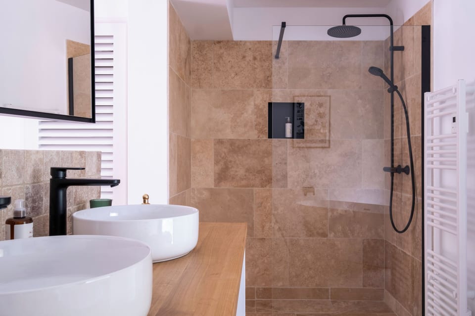 Superior Duplex | Bathroom | Designer toiletries, hair dryer, towels, soap