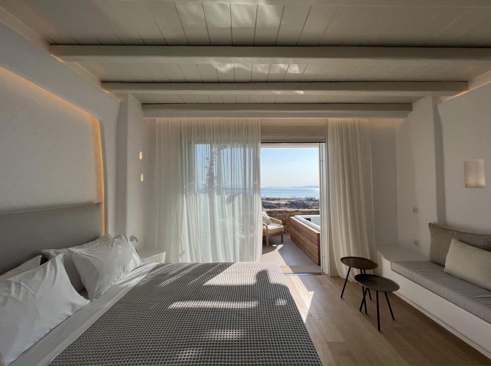 Junior Suite with Outdoor Hot Tub | 1 bedroom, pillowtop beds, minibar, in-room safe