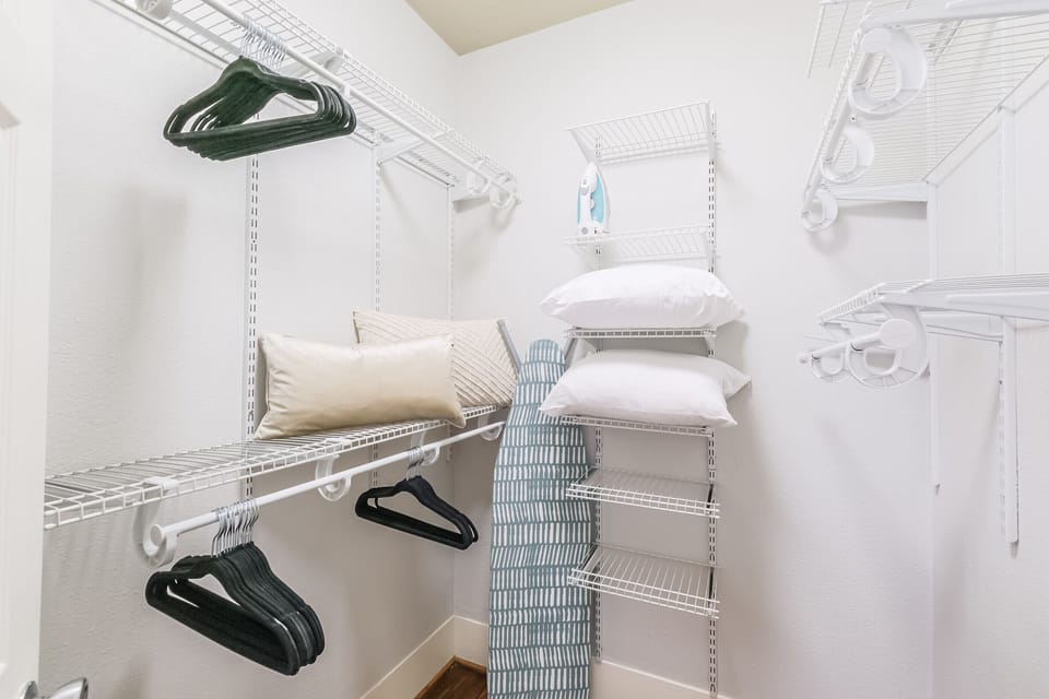 King bedroom walk-in closet, hangers