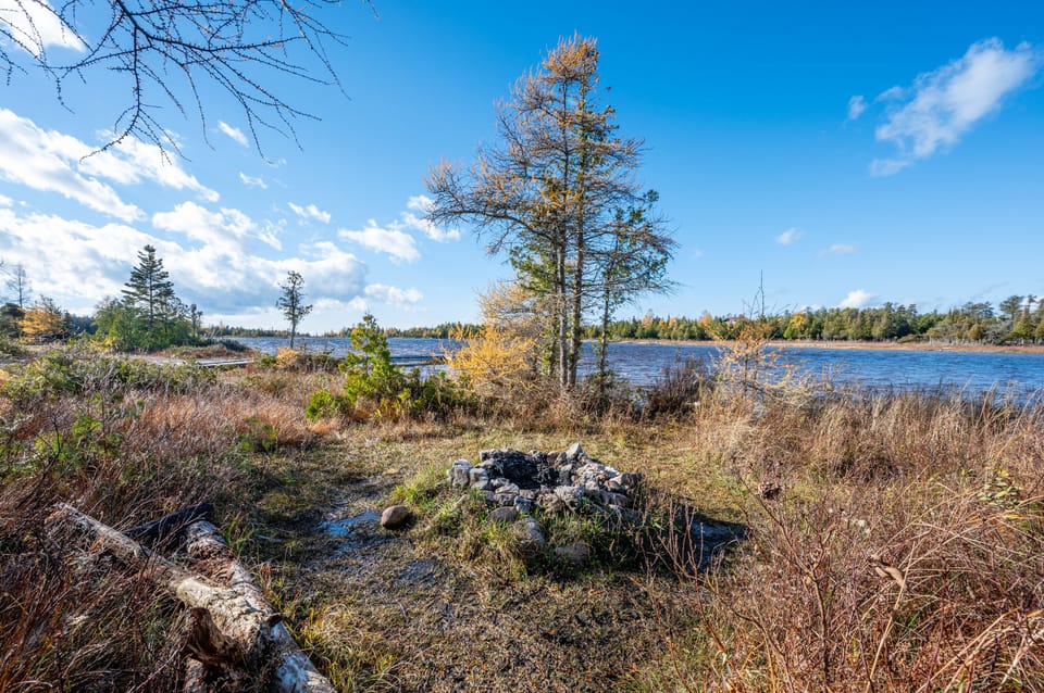 Gather around the firepit along the Lake.