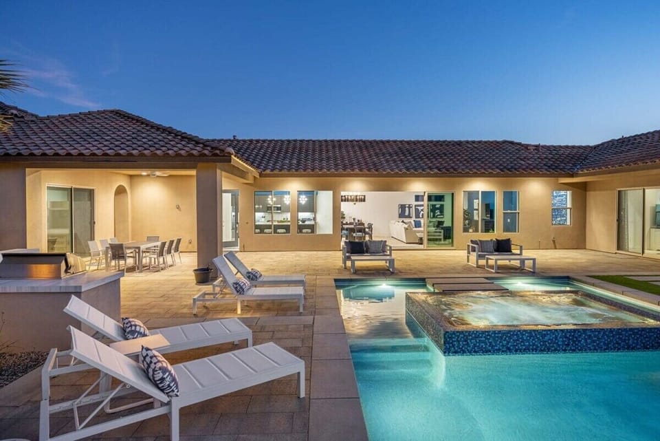 Gorgeous evening view of the pool and lounge area.