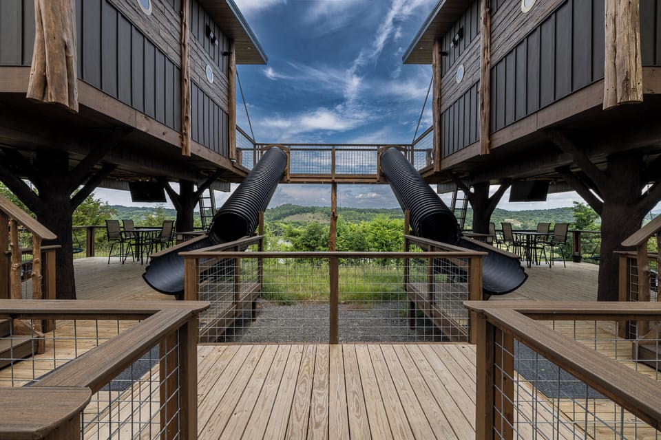 DUAL RACING 20-FOOT SLIDES - TWO SLIDES - DOUBLE THE FUN AT LAND OF THE FREE & HOME OF THE BRAVE TREE FORT DOUBLE TREEHOUSES