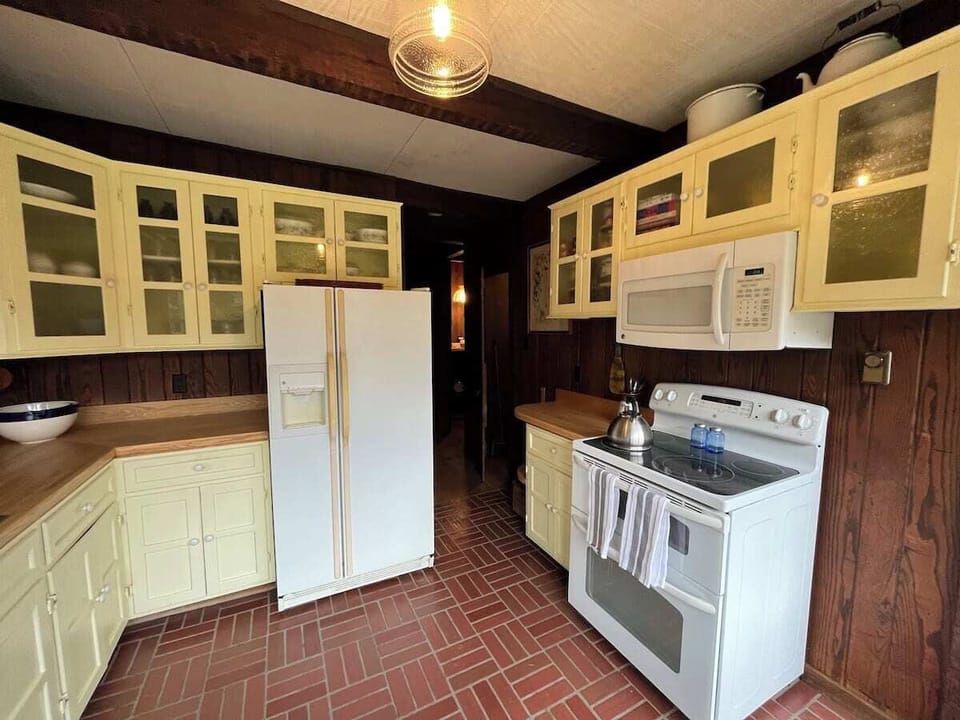The kitchen is located just off the dining area.