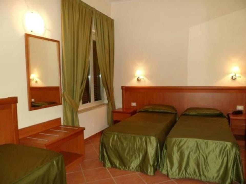Classic Triple Room | Minibar, in-room safe, desk, soundproofing