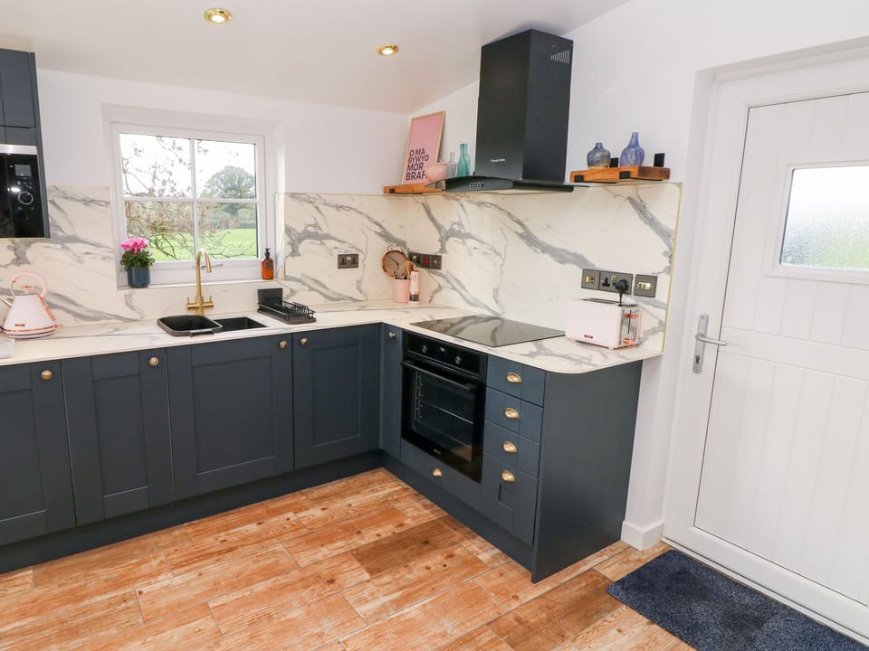 Fridge, electric kettle, toaster, cookware/dishes/utensils