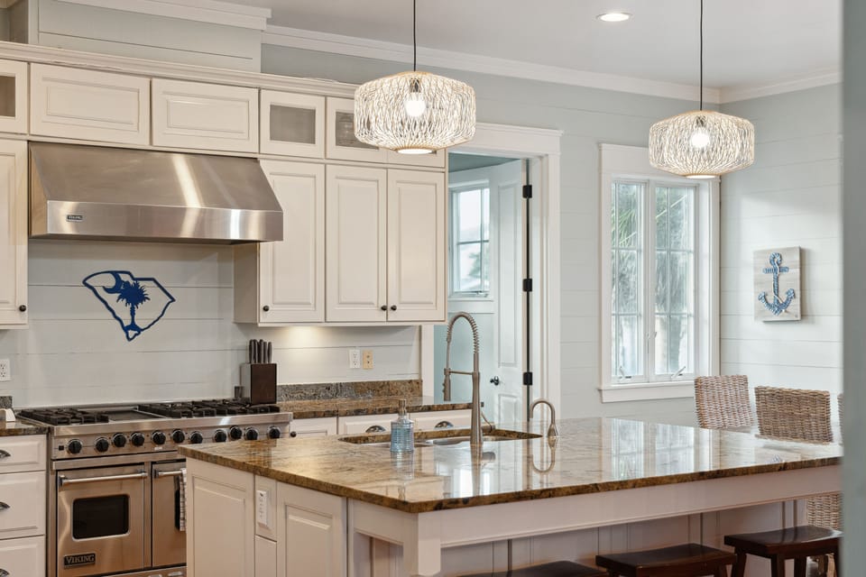 The kitchen also includes a large island, perfect for entertaining.