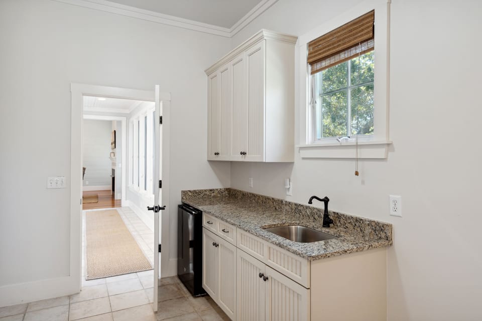 Wet bar in second bedroom on main level.