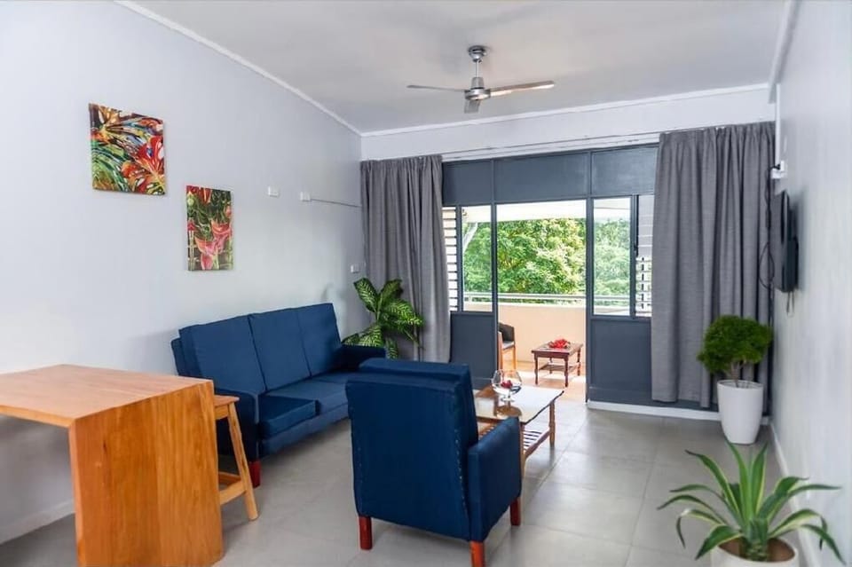 Family Deluxe Room | Living area | 32-inch Smart TV with digital channels, pay movies, streaming services
