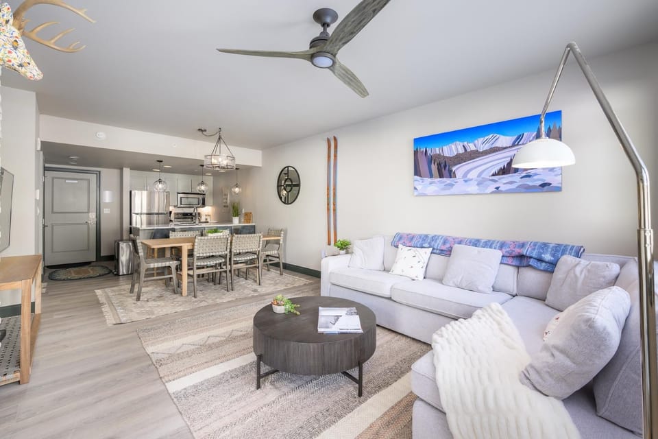 Living room leads into the dining area and kitchen
