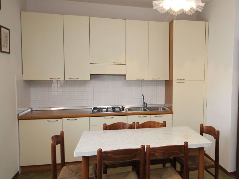 Furniture, Table, Cabinetry, Countertop, Wood, Interior Design, Wood Stain, Floor, Flooring, Kitchen
