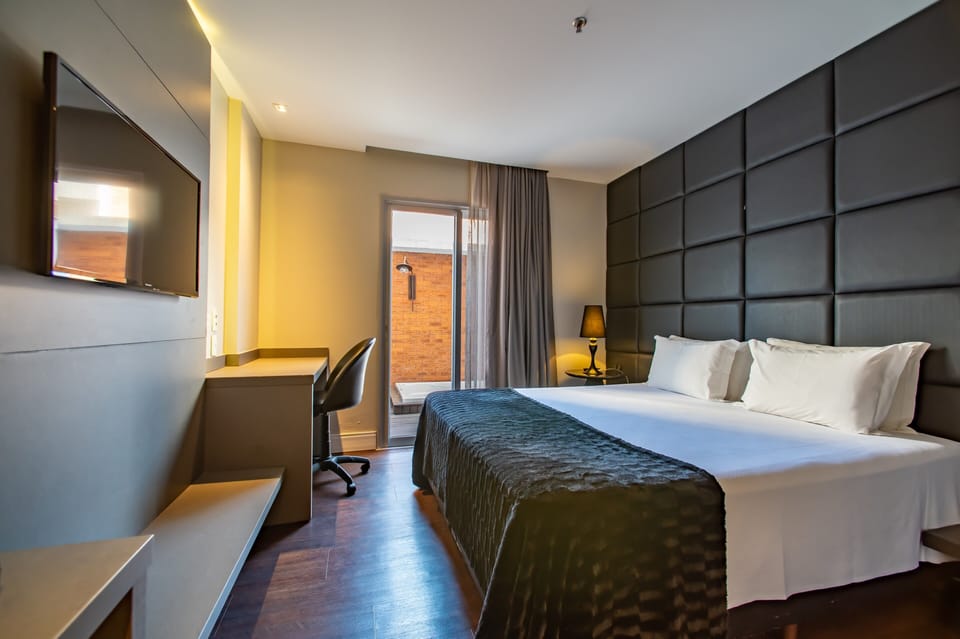 Superior Suite, Jetted Tub | In-room safe, desk, free WiFi, bed sheets