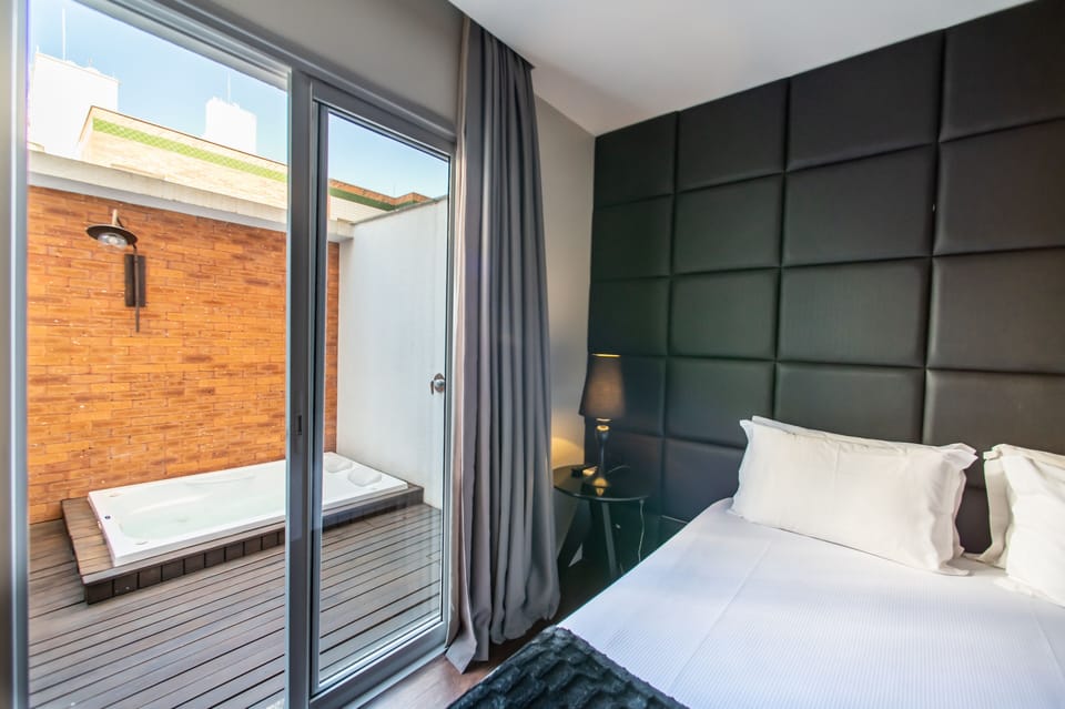 Superior Suite, Jetted Tub | In-room safe, desk, free WiFi, bed sheets