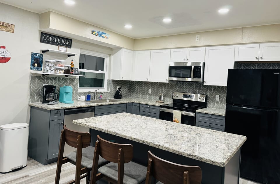 The kitchen island is perfect for cozy gathering