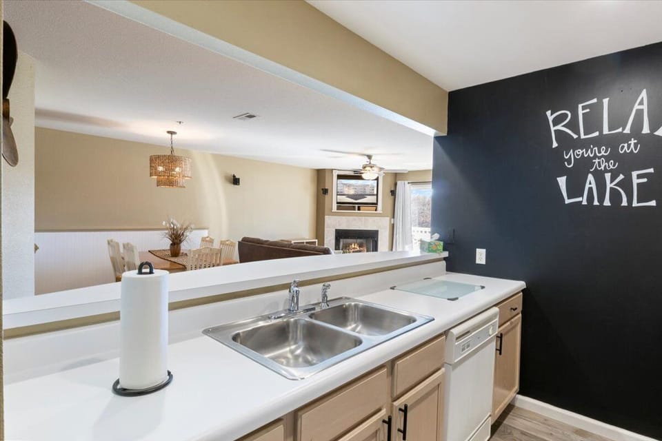 Kitchen and the open view of the living room.