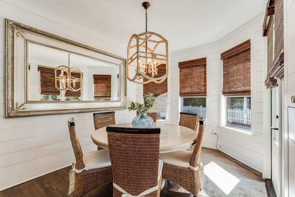 - Bright dining nook is a sun drenched spot for breakfast, board games, or dinners - Surrounded by windows and coastal textures, it brings the outdoors in beautifully - Gather around the round table for meals, stories, and vacation memories