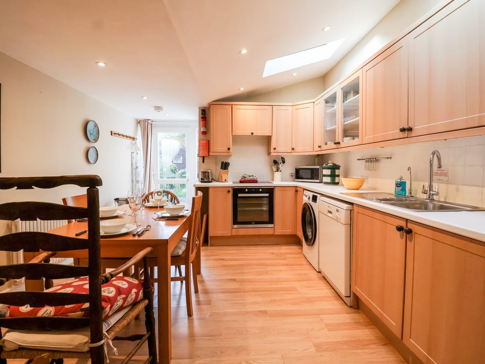 Fridge, dishwasher, electric kettle, cookware/dishes/utensils