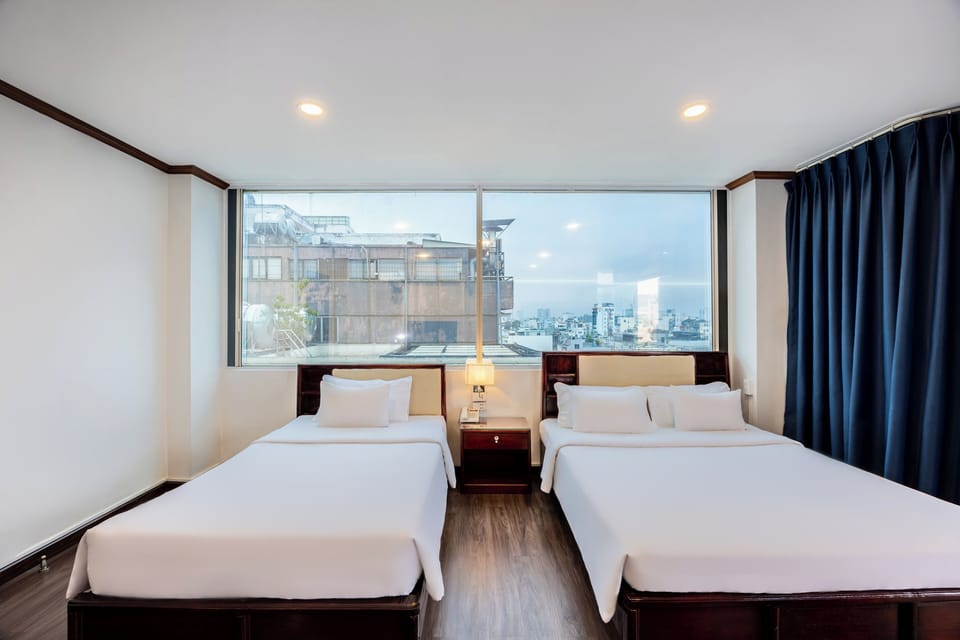 Family Room, 1 Bedroom, Air conditioning | Minibar, in-room safe, desk, blackout drapes