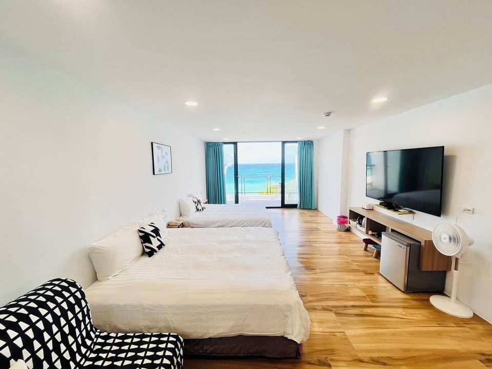 Family Quadruple Room, 2 Double Beds, Balcony, Ocean View | Soundproofing, free WiFi, bed sheets
