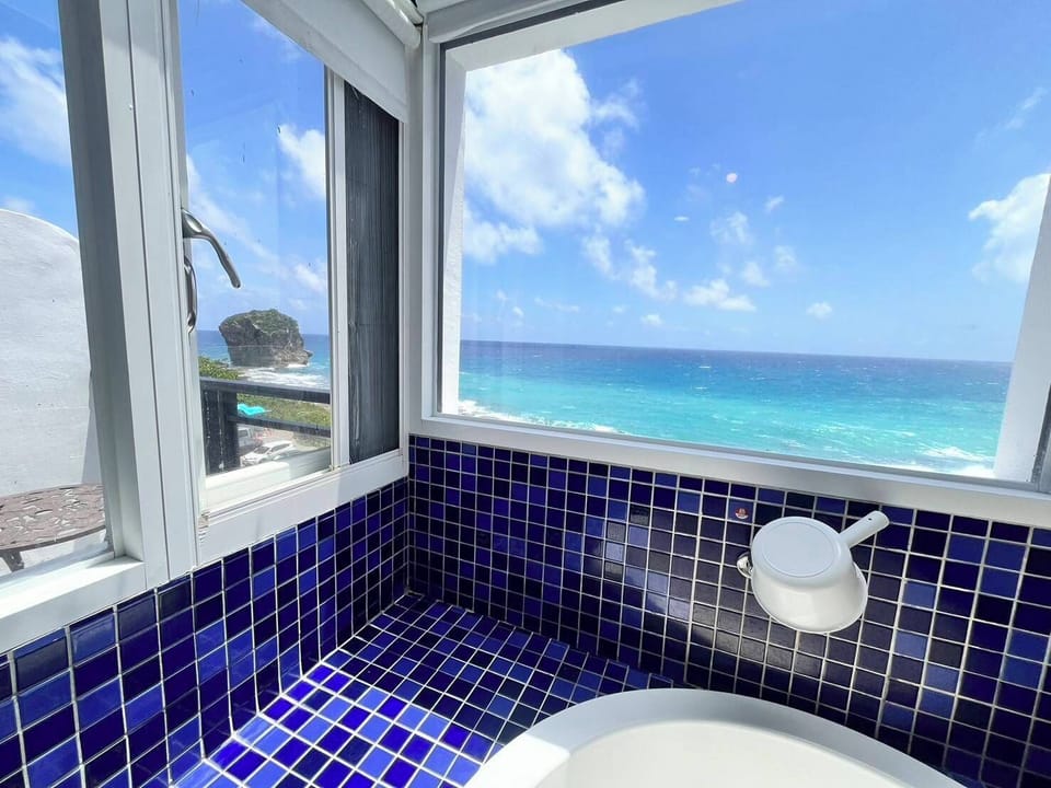 Deluxe Double Room, 1 Double Bed, Balcony, Ocean View | Bathroom | Free toiletries, hair dryer, slippers, towels