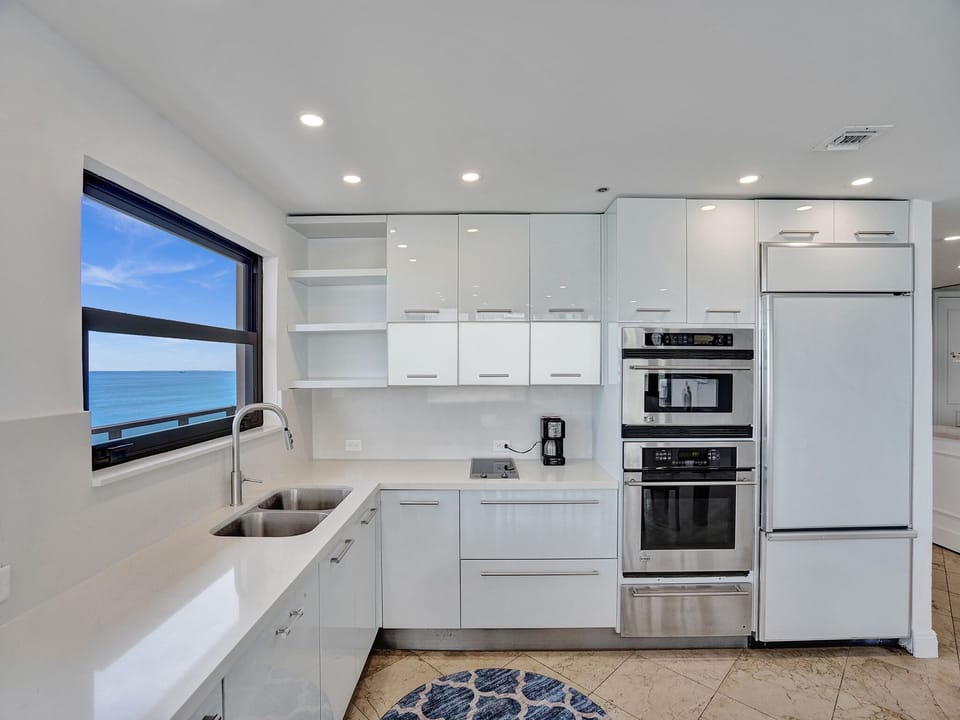 Oceanfront Penthouse Amazing Views PH-2 | Private kitchen | Full-size fridge, microwave, oven, stovetop