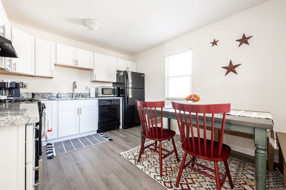 Compact kitchen beside dining area