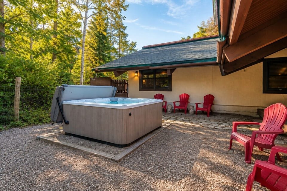Unwind in the private hot tub surrounded by peaceful aspens after a day exploring Steamboat.