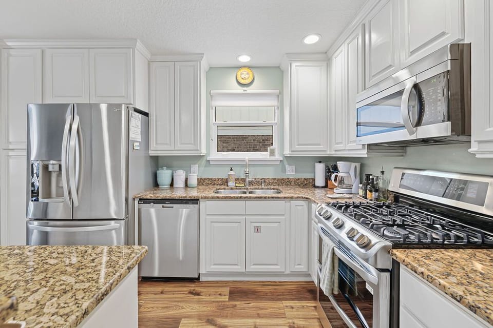 Kitchen with modern appliances and storage