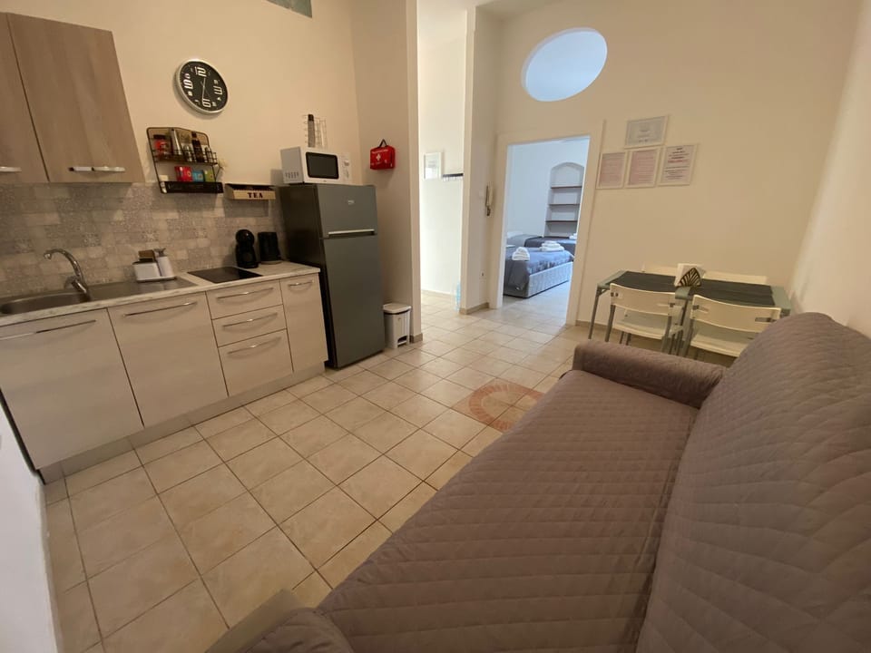 Comfort Apartment | Private kitchen | Full-size fridge, microwave, stovetop, electric kettle