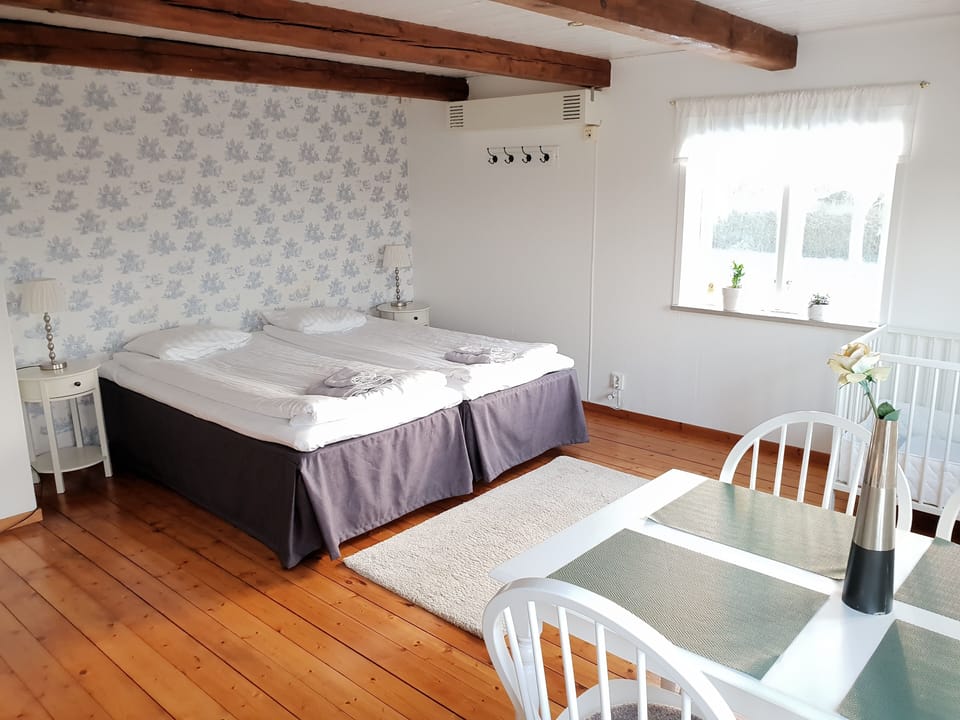 Family Room, Shared Bathroom | Individually decorated, laptop workspace, blackout drapes, travel crib