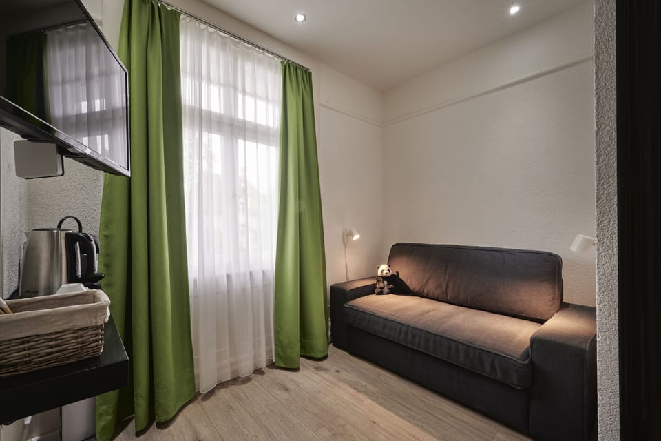 Deluxe Villa, 2 Bedrooms, Private Bathroom, Garden View | Living area | Flat-screen TV, first-run movies