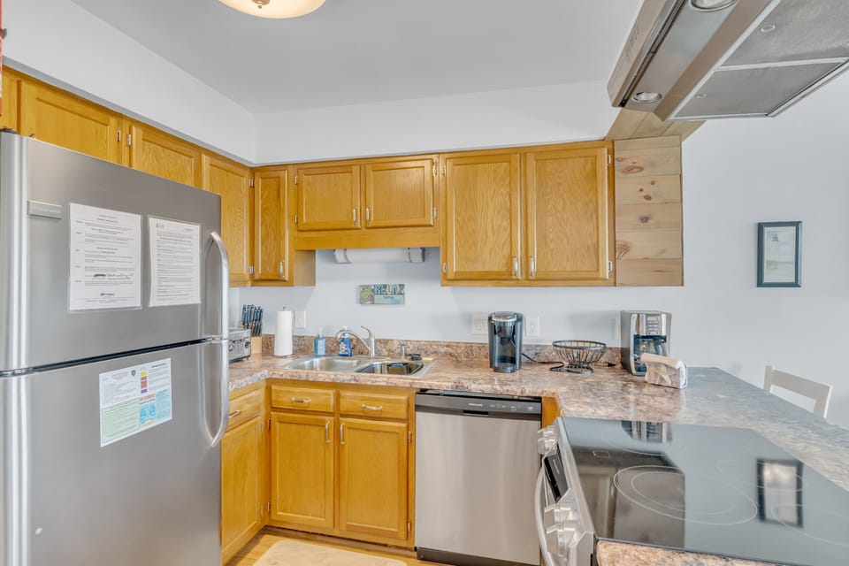 Your fully equipped kitchen features granite counters, stainless appliances, and everything needed to cook memorable meals during your stay.