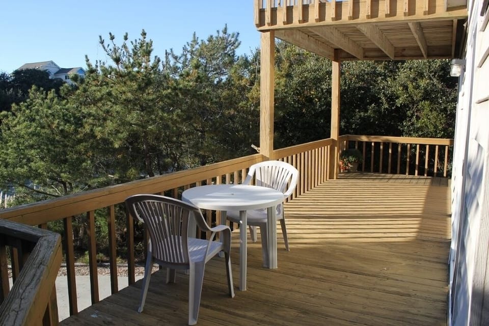 Step onto your private deck to enjoy morning coffee with treetop views and peaceful surroundings.