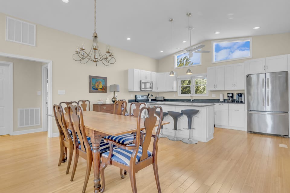 Your bright, airy kitchen and dining space invites memorable meals with modern appliances and elegant touches.
