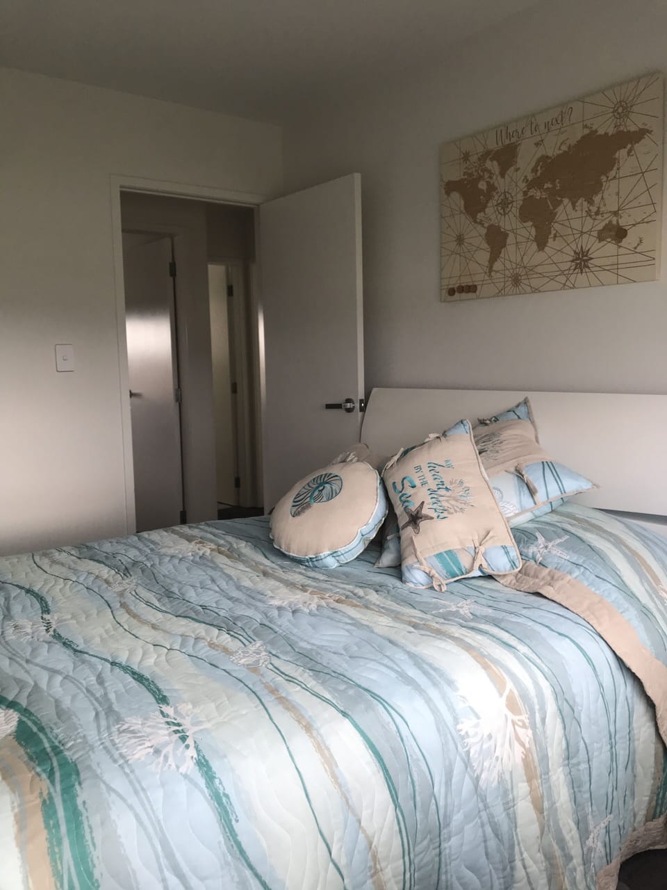Bedroom two with queen sized bed and double wardrobe