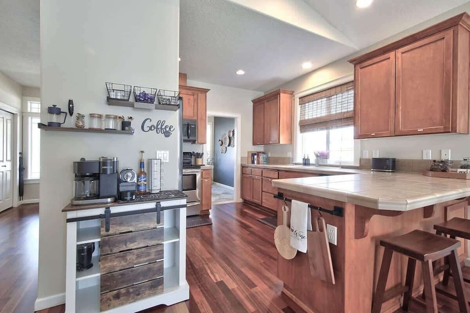 Start your mornings right with a dedicated coffee station and a fully equipped kitchen just steps away.