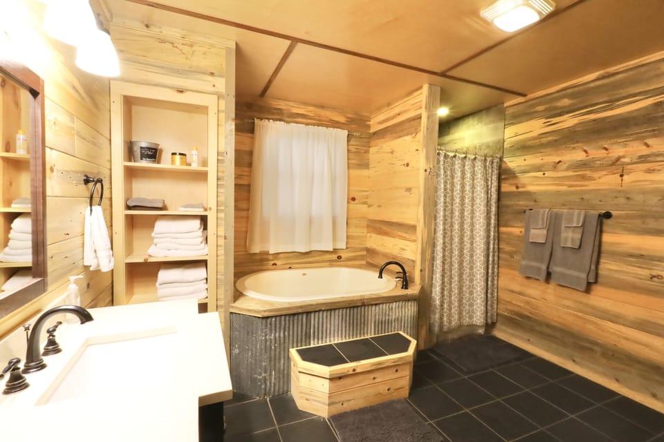 Private master bath soaker tub and walk in shower.