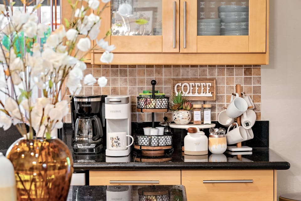 Coffee bar with drip coffee maker, Keurig, K-cups, and ground coffee
