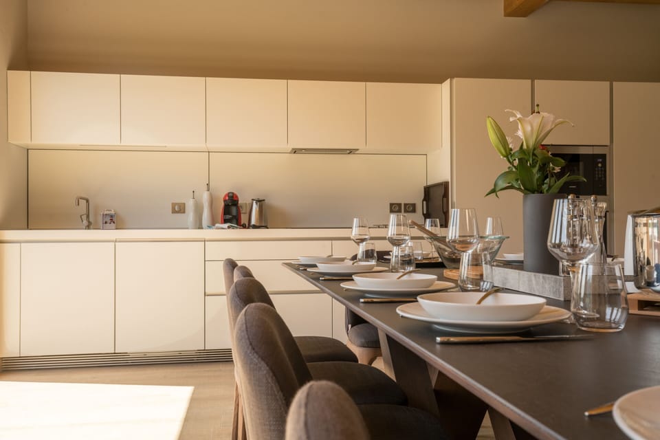 Enjoy a delicious meal at the large dining table!