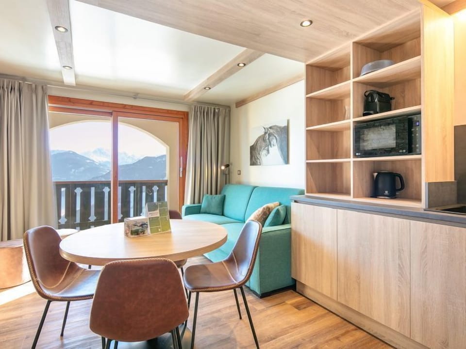 Enjoy the warm and cozy decor. Please note photos are representative and actual unit may differ.