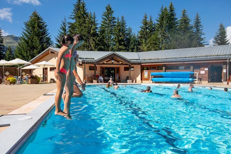 Take a dip in the municipal pool of Doucy.