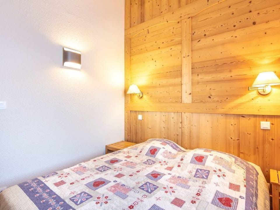 Relax on the comfy bed after a day outside.