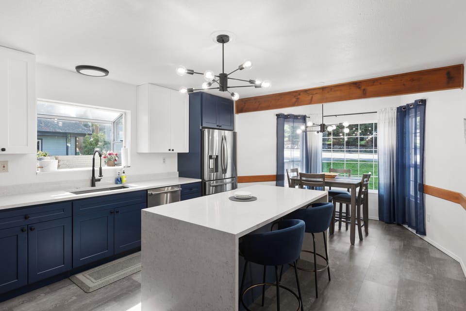 Kitchen island seating for 2 with kitchen table seating for 4. 